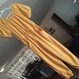 Romper with pockets, waist band, buttons on back